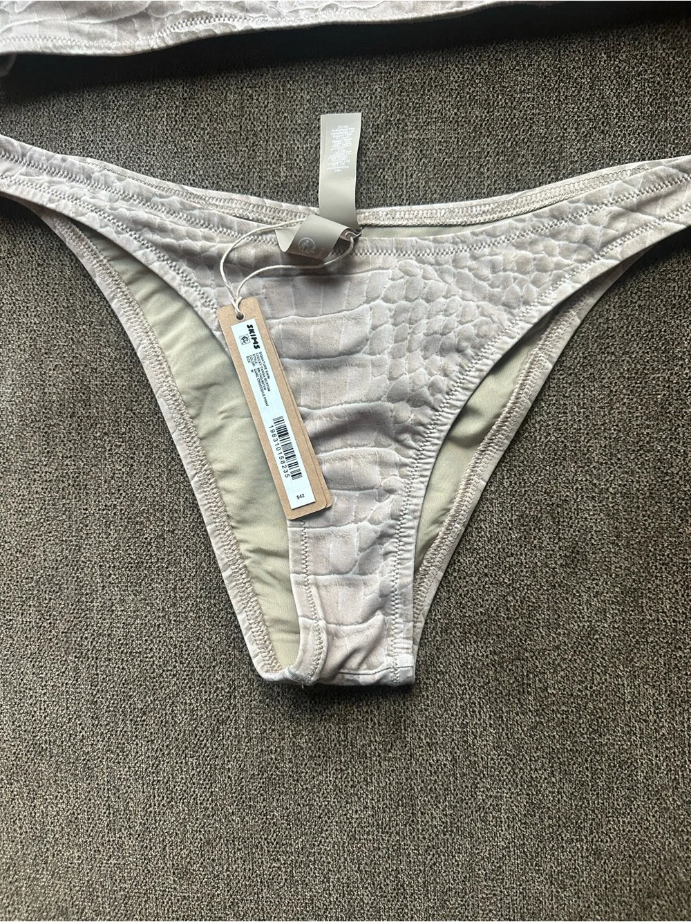 Skims set   signature swim cheeky tanga bottom and signature swin micro bandeau.